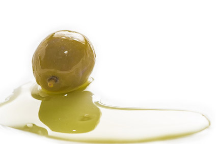 Green olives and olive oil isolated on white background